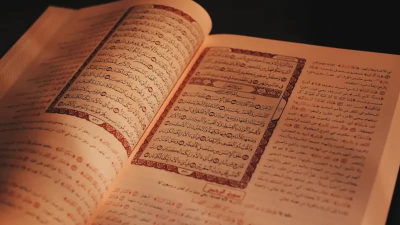 Muslim family checking a Ramadan calendar countdown together at home